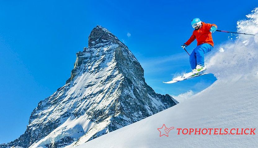Un esquiador en polvo fresco junto al Matterhorn